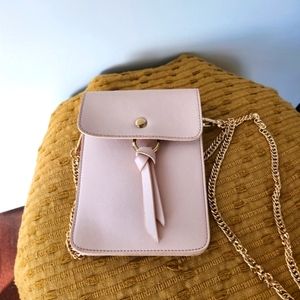 Small light pink crossbody bag